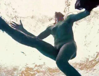 Porno shooting underwater. Naked Damsel unclothes off her
